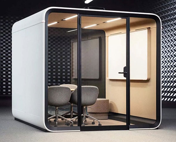 Framery six smart meeting room acoustic pod with table, chairs and whiteboard
