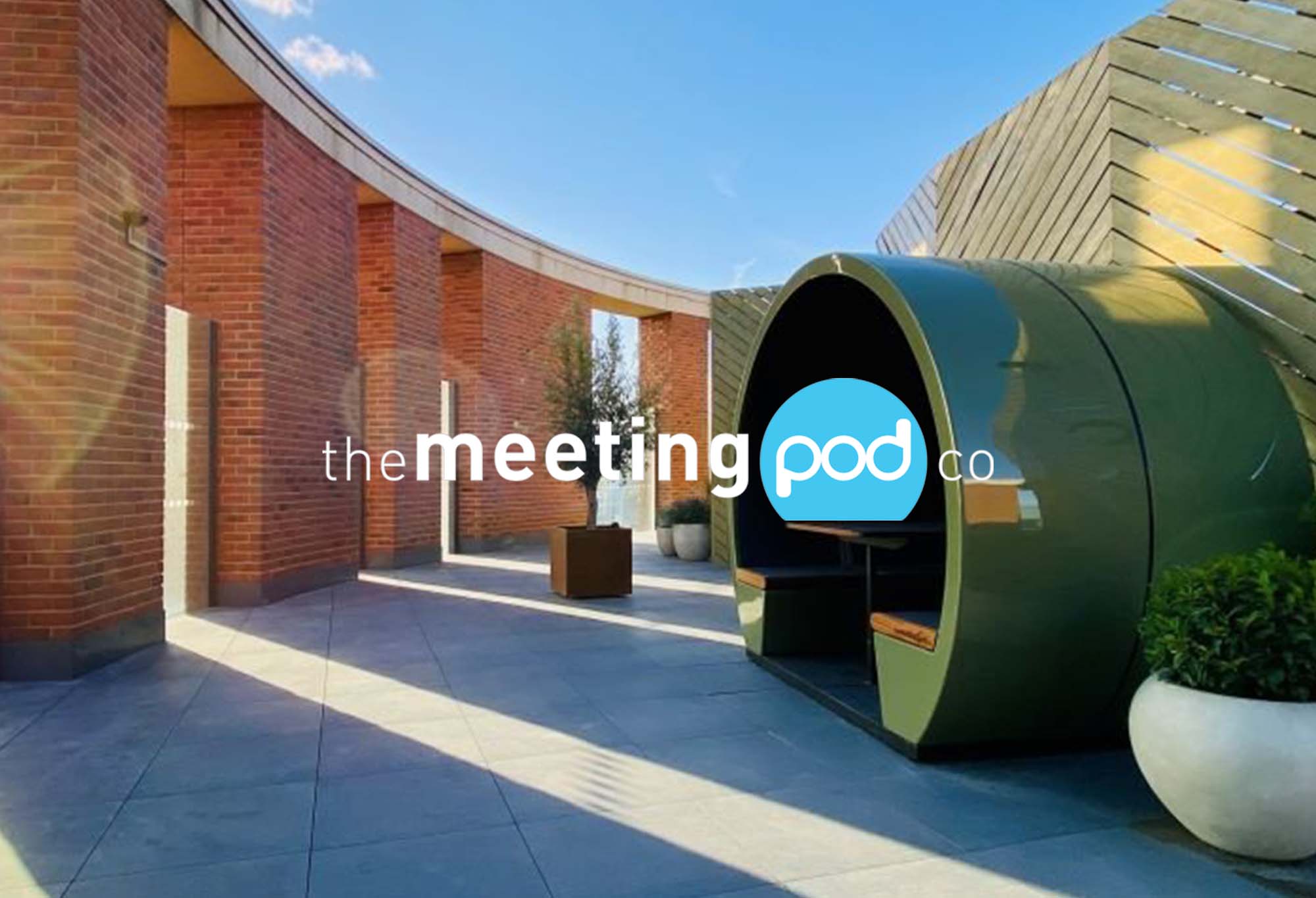 The Meeting Pod Co logo with an outdoor green pod in the background